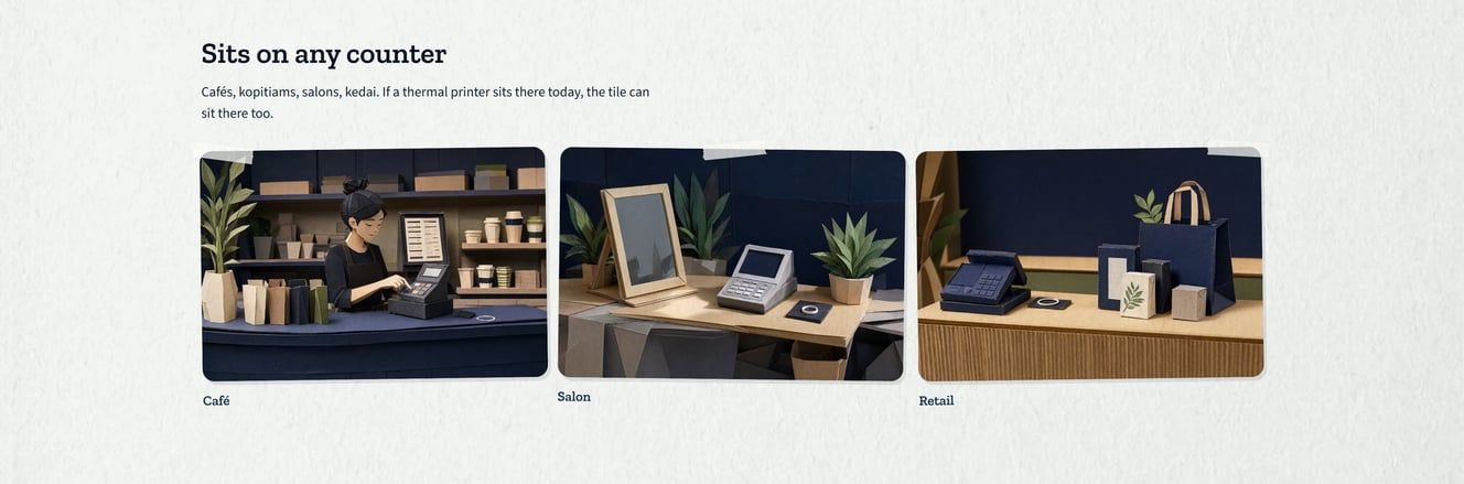 Three papercraft counters — café, salon and retail — each with a POS and the tile beside it.